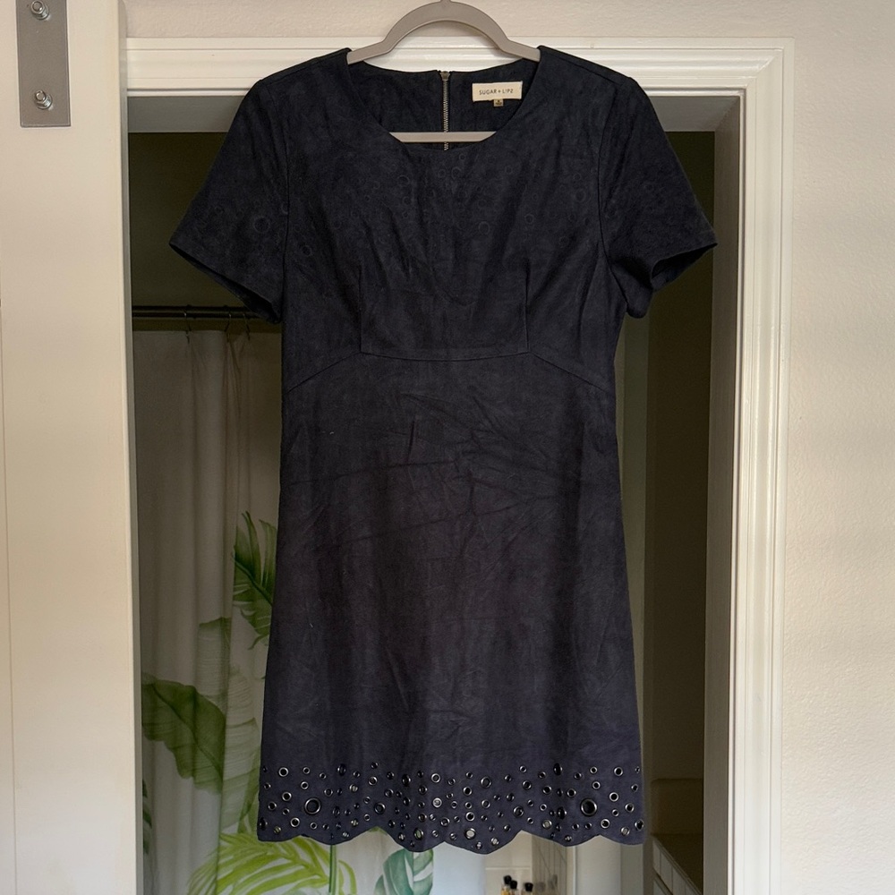 Elegant Black Mini Dress with Eyelet Design